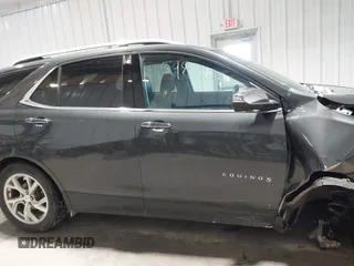 2019 Chevrolet Equinox Premier with VIN 2GNAXXEV2K6127055, listed as a IAAI auction lot 41598381 with 132,126 mi miles and . Bid and sale history available at DreamBid. Image 13.