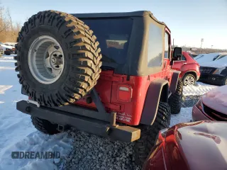 2003 Jeep Wrangler Sport with VIN 1J4FA49S73P301468, listed as a Copart auction lot 87415164 with 127,985 mi miles and Salvage Title. Bid and sale history available at carsss.com. Image 3.