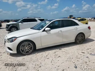 2014 Mercedes-Benz E 550 Sport with VIN WDDHF9BB2EB046306, listed as a Copart auction lot 61668975 with 114,494 mi miles and Salvage title. Bid and sale history available at DreamBid. Image 1.