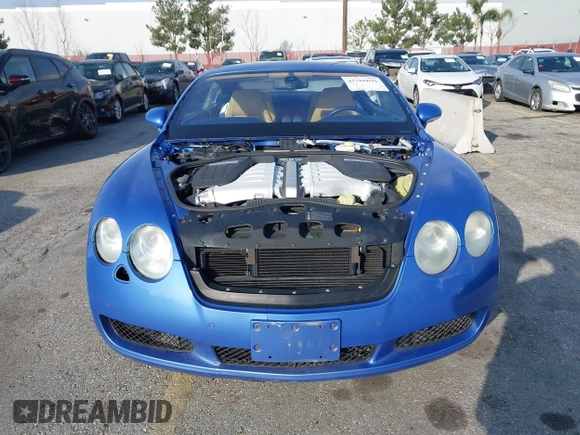 2004 Bentley Continental GT GT z VIN SCBCR63W74C022462, wystawiony jako IAAI lot #41586694 z przebiegiem 36 966 mil mil oraz . Historia ofert i sprzedaży dostępna na DreamBid. Obrazek 13.