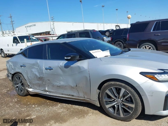 2021 Nissan Maxima SV with VIN 1N4AA6CV0MC501153, listed as a IAAI auction lot 41650382 with 56,686 mi miles. Bid and sale history available at carsss.com. Image 14.