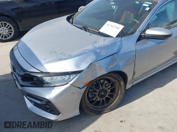 2020 Honda Civic Si with VIN 2HGFC1E57LH704323, listed as a IAAI auction lot 41742768 with 34,246 mi miles and . Bid and sale history available at DreamBid. Image 6.
