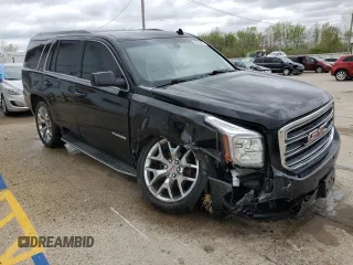 2015 GMC Yukon SLT z VIN 1GKS2BKC1FR112708, wystawiony jako Copart lot #53963165 z przebiegiem 123 331 mil mil oraz Szkoda całkowita • Salvage title. Historia ofert i sprzedaży dostępna na DreamBid. Obrazek 4.