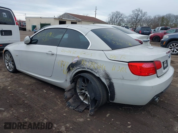 2011 BMW 3 Series 335i with VIN WBADX7C51BE742780, listed as a IAAI auction lot 41636961 with Not Provided miles and . Bid and sale history available at carsss.com. Image 3.