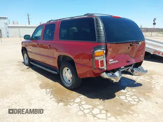 2003 GMC Yukon XL SLT z VIN 1GKEC16Z63J166423, wystawiony jako IAAI lot #42330690 z przebiegiem 190 589 mil mil oraz . Historia ofert i sprzedaży dostępna na DreamBid. Obrazek 3.