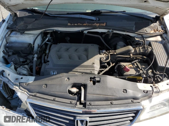 2000 Honda Odyssey EX with VIN 2HKRL1861YH564896, listed as a Copart auction lot 50635805 with 156,313 mi miles and Salvage Title. Bid and sale history available at DreamBid. Image 12.