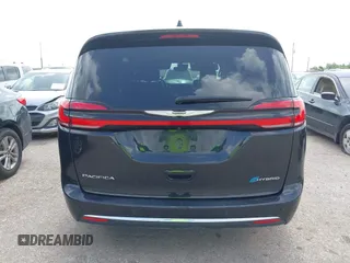 2023 Chrysler Pacifica Hybrid Touring L with VIN 2C4RC1L75PR611901, listed as a IAAI auction lot 42626500 with 44,156 mi miles and . Bid and sale history available at DreamBid. Image 16.