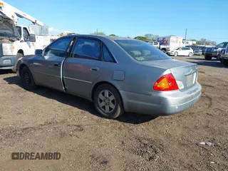 2001 Toyota Avalon XL w/Bucket Seats with VIN 4T1BF28B91U148985, listed as a IAAI auction lot 41538121 with 161,474 mi miles. Bid and sale history available at carsss.com. Image 3.