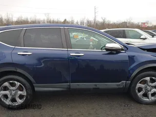 2019 Honda CR-V EX with VIN 2HKRW2H54KH630921, listed as a IAAI auction lot 41366277 with 103,075 mi miles and . Bid and sale history available at DreamBid. Image 14.