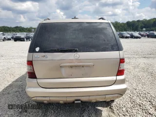 2002 Mercedes-Benz M-Class with VIN 4JGAB54E72A322046, listed as a Copart auction lot 74393084 with 128,015 mi miles and Salvage Title. Bid and sale history available at carsss.com. Image 6.