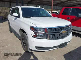 2018 Chevrolet Tahoe Commercial z VIN 1GNLCDEC0JR283440, wystawiony jako IAAI lot #41280493 z przebiegiem 241 531 mil mil oraz . Historia ofert i sprzedaży dostępna na DreamBid. Obrazek 1.