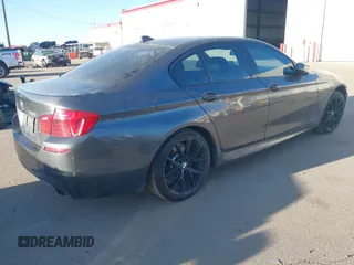 2015 BMW 5 Series 535i xDrive with VIN WBA5B3C58FD547704, listed as a IAAI auction lot 41764129 with 152,649 mi miles. Bid and sale history available at carsss.com. Image 4.