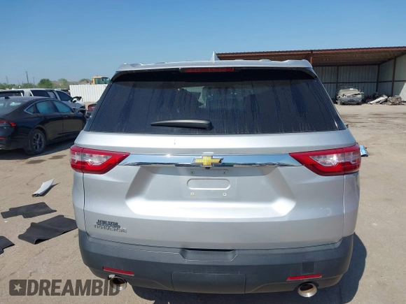 2018 Chevrolet Traverse LS z VIN 1GNERFKWXJJ120682, wystawiony jako IAAI lot #42007628 z przebiegiem 112 795 mil mil oraz . Historia ofert i sprzedaży dostępna na DreamBid. Obrazek 16.
