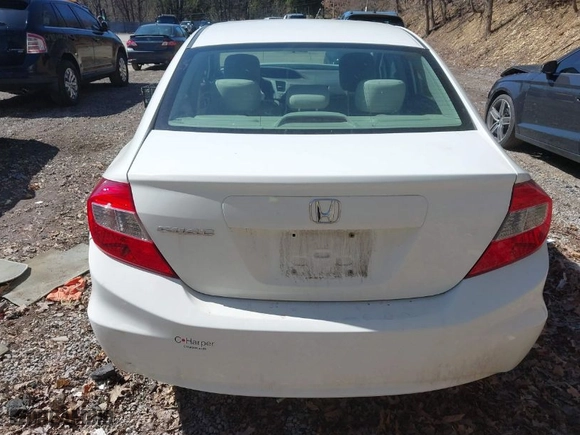 2012 Honda Civic Sdn LX with VIN 2HGFB2F55CH318426, listed as a IAAI auction lot 41856121 with 213,905 mi miles. Bid and sale history available at carsss.com. Image 17.
