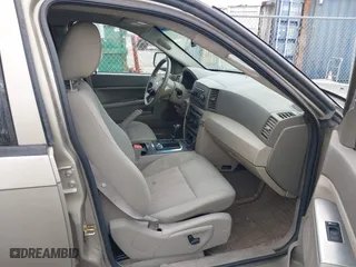 2005 Jeep Grand Cherokee Laredo with VIN 1J4HR48N25C608120, listed as a IAAI auction lot 41933071 with 213,189 mi miles. Bid and sale history available at carsss.com. Image 5.
