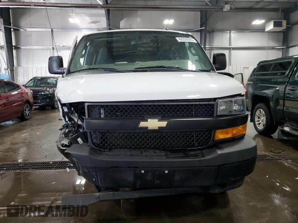 2018 Chevrolet Express Cargo Van with VIN 1GCWGAFP5J1242813, listed as a Copart auction lot 42059045 with 98,879 mi miles and Salvage Title. Bid and sale history available at carsss.com. Image 5.