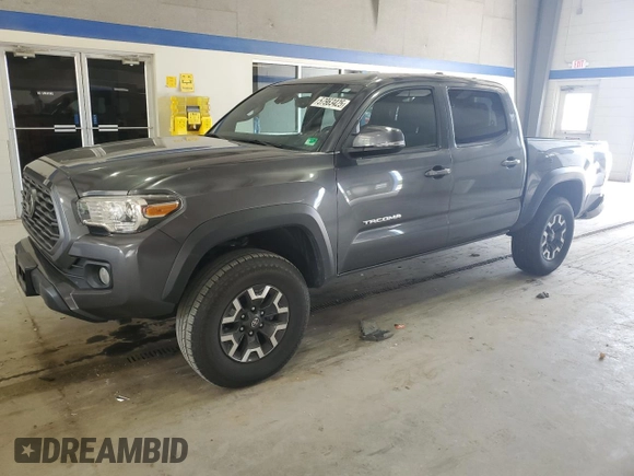 2021 Toyota Tacoma SR with VIN 3TMCZ5ANXMM425903, listed as a Copart auction lot 57963425 with 61,458 mi miles and Salvage title. Bid and sale history available at DreamBid. Image 1.