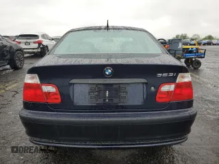 2000 BMW 3 Series 323i with VIN WBAAM3340YFP70049, listed as a Copart auction lot 58064415 with 122,574 mi miles and Clean title. Bid and sale history available at DreamBid. Image 6.