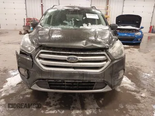 2018 Ford Escape SE with VIN 1FMCU9GD8JUA53114, listed as a IAAI auction lot 41592808 with 167,659 mi miles. Bid and sale history available at carsss.com. Image 6.