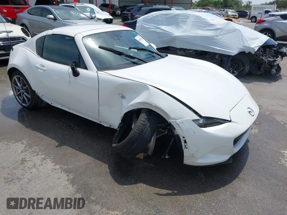2023 Mazda MX-5 Miata Grand Touring с VIN JM1NDAM71P0560062, выставлен на аукционе IAAI как лот 42065123 с пробегом 11 320 миль миль и . История ставок и продаж доступна на DreamBid. Изображение 1.