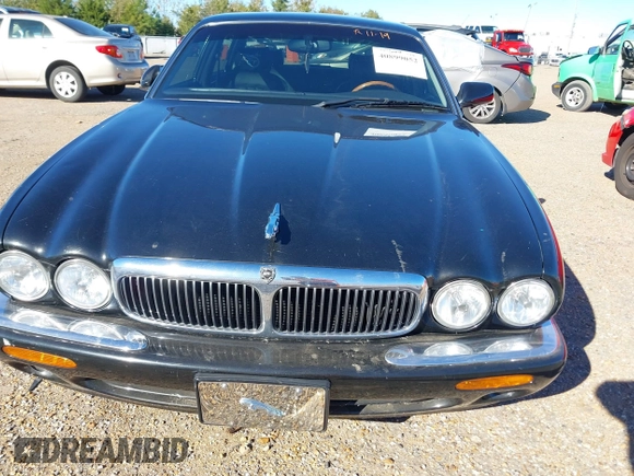2000 Jaguar XJ with VIN SAJDA23C5YLF19267, listed as a IAAI auction lot 40899052 with 92,553 mi miles and . Bid and sale history available at DreamBid. Image 6.