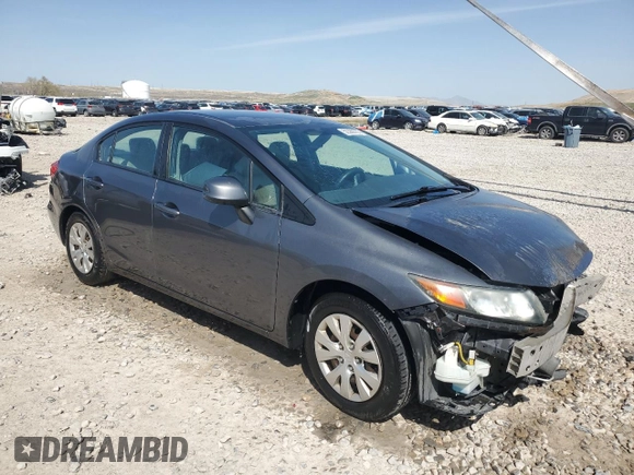 2012 Honda Civic LX with VIN 2HGFB2F57CH555578, listed as a Copart auction lot 52369765 with 196,032 mi miles and Salvage Title. Bid and sale history available at DreamBid. Image 4.