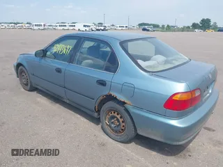1999 Honda Civic LX z VIN 1HGEJ6678XL018332, wystawiony jako IAAI lot #42413697 z przebiegiem 196 167 mil mil oraz . Historia ofert i sprzedaży dostępna na DreamBid. Obrazek 3.
