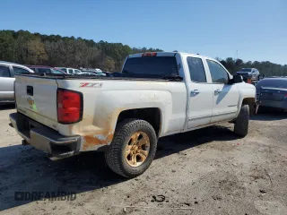 2014 Chevrolet Silverado 1500 LTZ with VIN 1GCVKSEC9EZ241962, listed as a Copart auction lot 87309474 with 169,340 mi miles and Salvage Title. Bid and sale history available at DreamBid. Image 3.