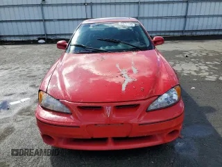 1999 Pontiac Grand Am GT1 with VIN 1G2NW52E5XM768638, listed as a Copart auction lot 49077115 with 113,018 mi miles and Salvage Title. Bid and sale history available at carsss.com. Image 5.