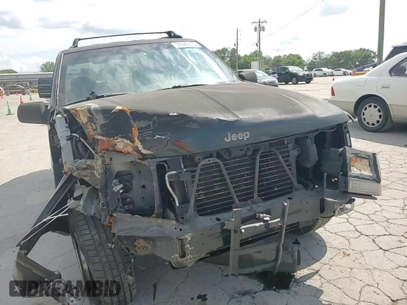 1998 Jeep Grand Cherokee Laredo with VIN 1J4GZ48S7WC222845, listed as a Copart auction lot 59576115 with Not provided miles and Clean title. Bid and sale history available at DreamBid. Image 13.
