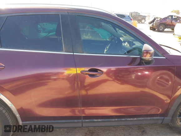 2019 Mazda CX-5 Sport with VIN JM3KFABM2K0686372, listed as a IAAI auction lot 41770183 with 57,202 mi miles and . Bid and sale history available at DreamBid. Image 13.