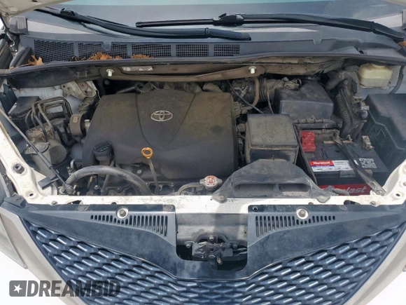 2017 Toyota Sienna SE with VIN 5TDXZ3DC9HS821990, listed as a Copart auction lot 60912365 with 182,672 mi miles and Salvage title. Bid and sale history available at DreamBid. Image 12.
