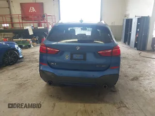 2019 BMW X1 xDrive28i with VIN WBXHT3C53K5L36690, listed as a IAAI auction lot 42012992 with 70,339 mi miles. Bid and sale history available at carsss.com. Image 16.