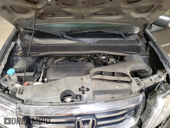 2013 Honda Pilot Touring z VIN 5FNYF3H91DB034638, wystawiony jako Copart lot #59858755 z przebiegiem 115 445 mil mil oraz Szkoda całkowita • Salvage title. Historia ofert i sprzedaży dostępna na DreamBid. Obrazek 12.