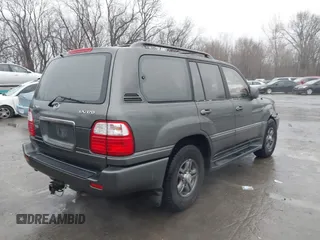 2002 Lexus LX 470 with VIN JTJHT00W923515897, listed as a IAAI auction lot 41155492 with 244,619 mi miles. Bid and sale history available at carsss.com. Image 4.