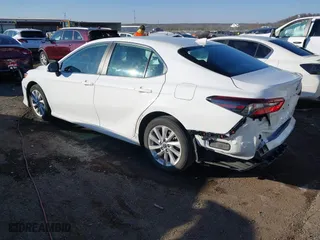 2023 Toyota Camry LE with VIN 4T1C11AK6PU181720, listed as a IAAI auction lot 41423643 with 42,610 mi miles. Bid and sale history available at carsss.com. Image 3.