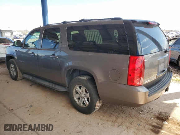 2013 GMC Yukon XL SLT with VIN 1GKS1KE09DR305240, listed as a Copart auction lot 53143565 with 210,872 mi miles and Salvage Title. Bid and sale history available at DreamBid. Image 2.