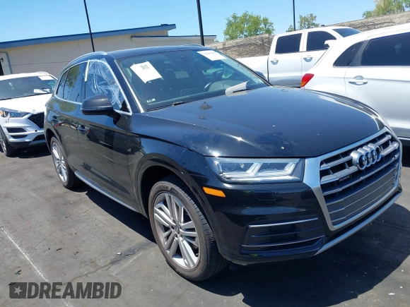 2018 Audi Q5 Premium Plus z VIN WA1BNAFY7J2094777, wystawiony jako IAAI lot #42265300 z przebiegiem Nie podano mil oraz . Historia ofert i sprzedaży dostępna na DreamBid. Obrazek 13.