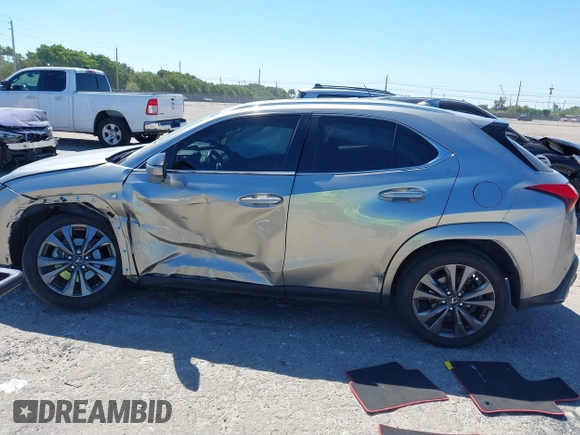 2022 Lexus UX 200 F Sport z VIN JTHE3JBH3N2056014, wystawiony jako IAAI lot #41832434 z przebiegiem 25 693 mil mil oraz . Historia ofert i sprzedaży dostępna na DreamBid. Obrazek 15.