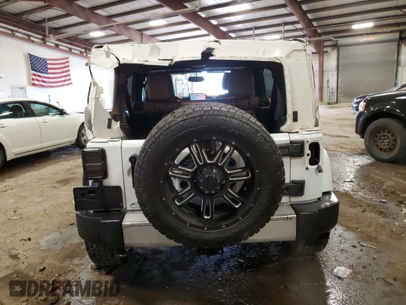 2015 Jeep Wrangler Unlimited Wrangler X with VIN 1C4HJWEG7FL671259, listed as a Copart auction lot 52334325 with 81,244 mi miles and Clean title. Bid and sale history available at DreamBid. Image 6.