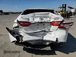 2018 Toyota Camry LE с VIN 4T1B11HK5JU073663, выставлен на аукционе Copart как лот 55656575 с пробегом 100 578 миль миль и Списание • Salvage title. История ставок и продаж доступна на DreamBid. Изображение 6.