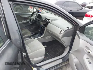 2009 Toyota Corolla with VIN 1NXBU40E99Z024895, listed as a IAAI auction lot 42034209 with 340,338 mi miles. Bid and sale history available at carsss.com. Image 5.