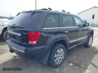 2010 Jeep Grand Cherokee Limited with VIN 1J4RR5GT8AC101758, listed as a IAAI auction lot 41824380 with 118,944 mi miles. Bid and sale history available at carsss.com. Image 4.