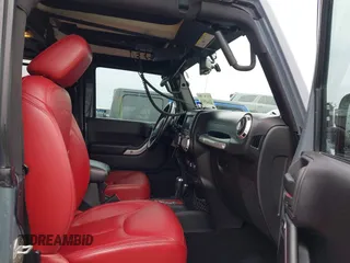 2013 Jeep Wrangler Rubicon 10th Anniversary with VIN 1C4BJWCG2DL651815, listed as a IAAI auction lot 41643919 with 98,297 mi miles and . Bid and sale history available at DreamBid. Image 5.