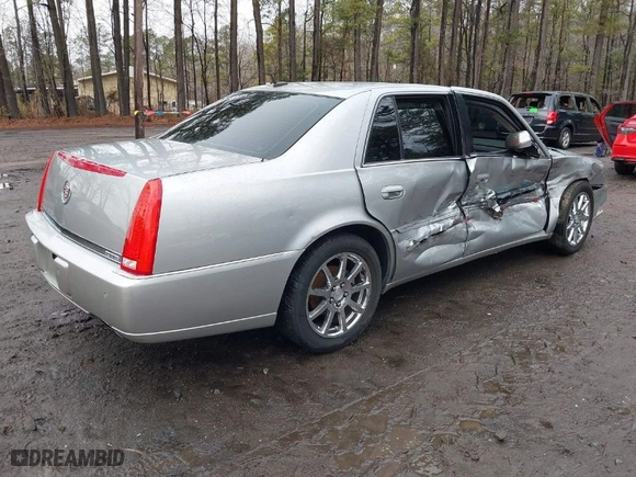 2008 Cadillac DTS w/1SE with VIN 1G6KD57918U155128, listed as a IAAI auction lot 41477233 with 123,479 mi miles. Bid and sale history available at carsss.com. Image 4.