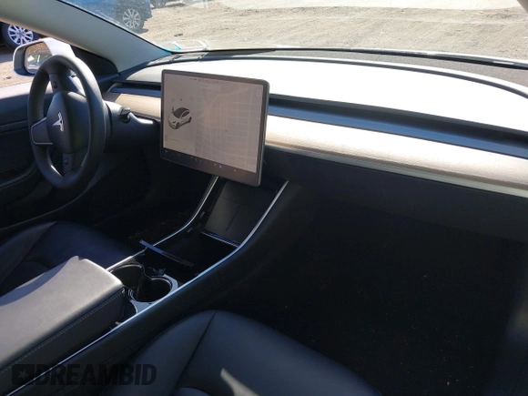 2020 Tesla Model 3 Standard Range Plus with VIN 5YJ3E1EA0LF783672, listed as a IAAI auction lot 41903431 with 52,157 mi miles and . Bid and sale history available at carsss.com. Image 5.