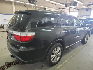 2013 Dodge Durango Crew z VIN 1C4RDJDGXDC672239, wystawiony jako Copart lot #59227905 z przebiegiem 167 982 mil mil oraz Szkoda całkowita • Salvage title. Historia ofert i sprzedaży dostępna na DreamBid. Obrazek 3.