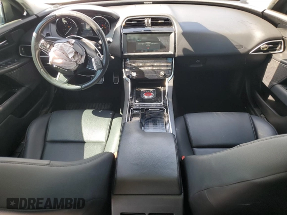 2019 Jaguar XE 25t with VIN SAJAR4FX6KCP49670, listed as a Copart auction lot 75340594 with 71,282 mi miles and Salvage Title. Bid and sale history available at carsss.com. Image 8.