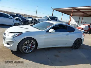 2013 Hyundai Genesis Coupe R-Spec z VIN KMHHU6KJ2DU101504, wystawiony jako IAAI lot #41469836 z przebiegiem 98 779 mil mil oraz . Historia ofert i sprzedaży dostępna na DreamBid. Obrazek 14.
