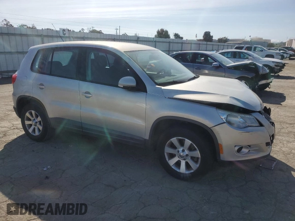 2010 Volkswagen Tiguan S with VIN WVGAV7AX9AW519312, listed as a Copart auction lot 48633055 with 94,740 mi miles and Salvage title. Bid and sale history available at DreamBid. Image 4.
